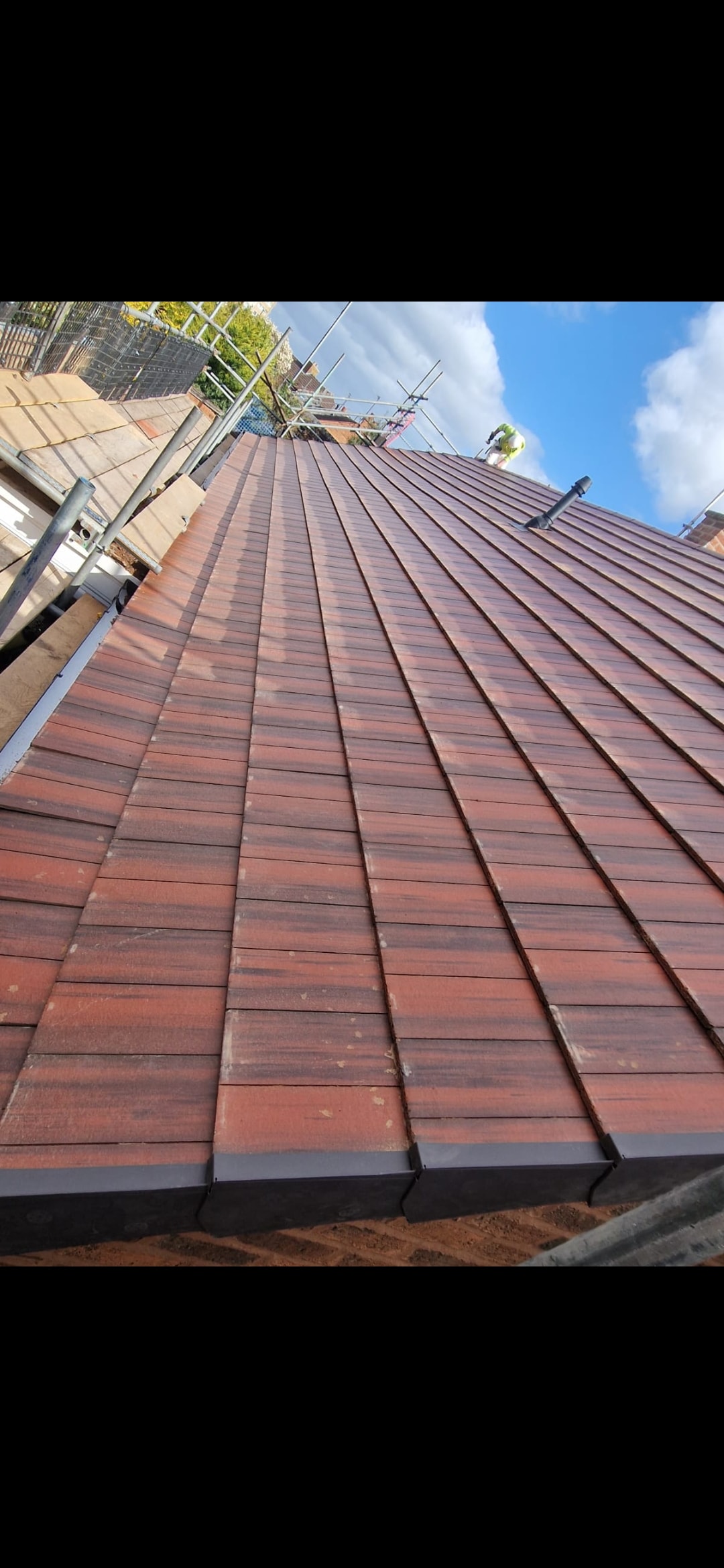 New red tile roof by All About Roofing Birmingham