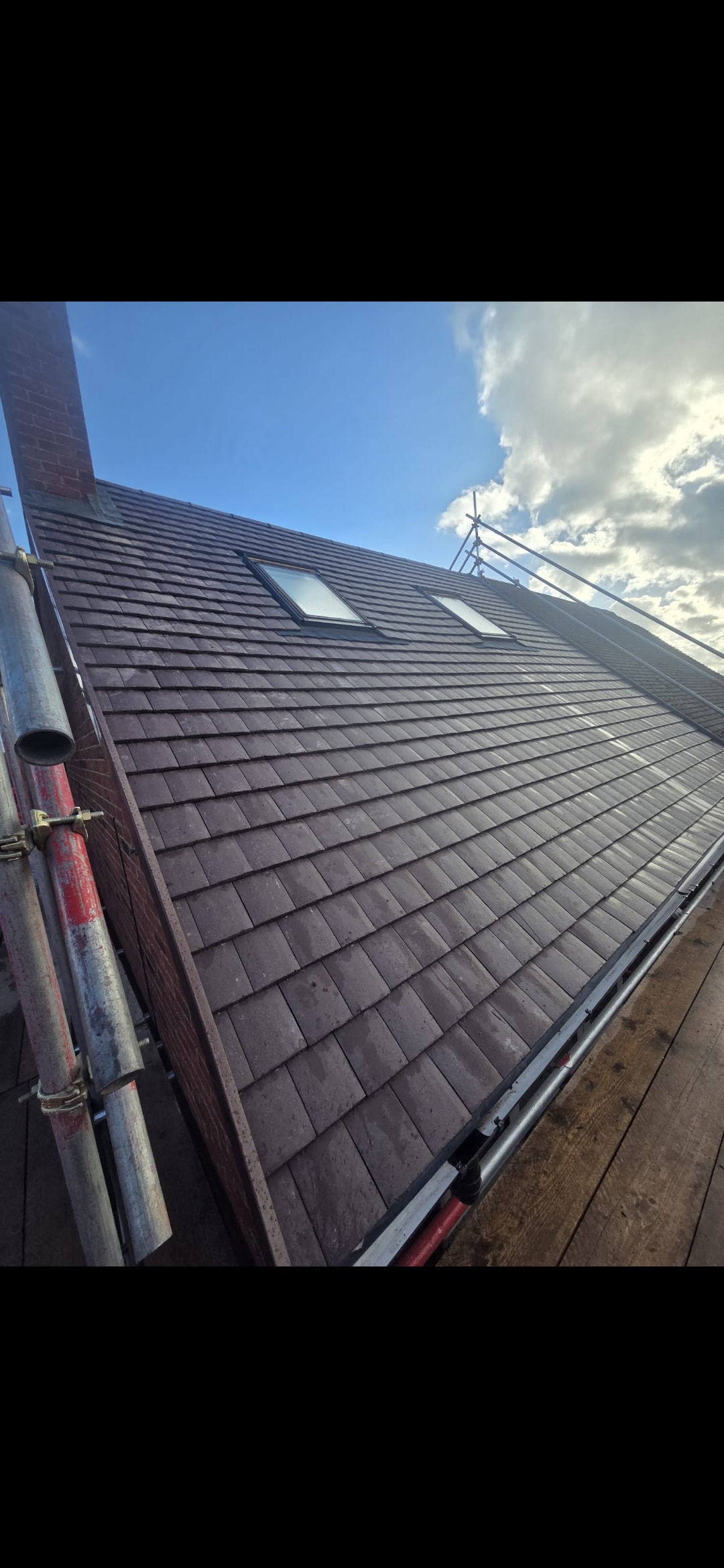 Dark tile reroof with Velux skylights Birmingham